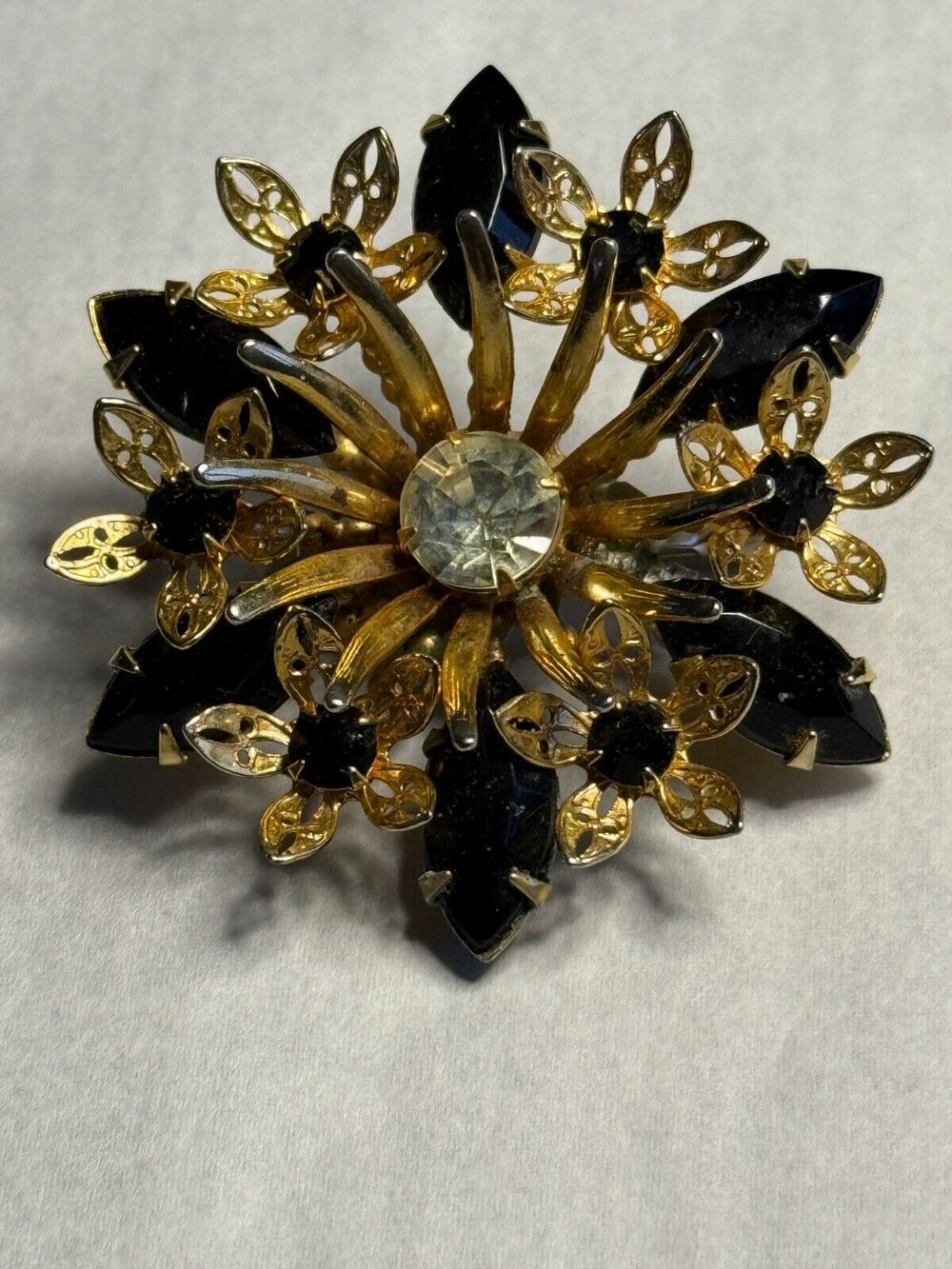 Vintage Black & Clear Rhinestone in Gold Tone Filigree Round Flower Brooch Pin